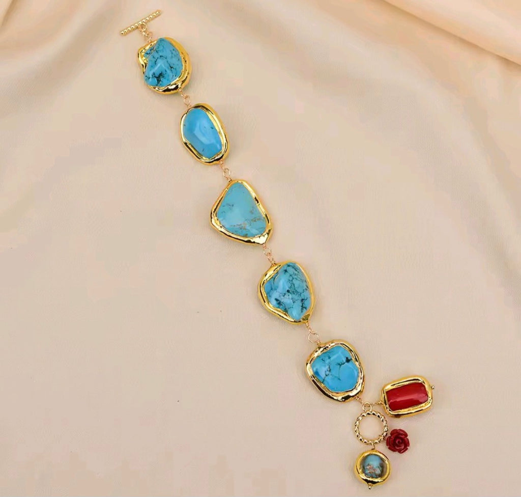 Pulsera en Cuentas de Cristal de Murano y Coral rojo