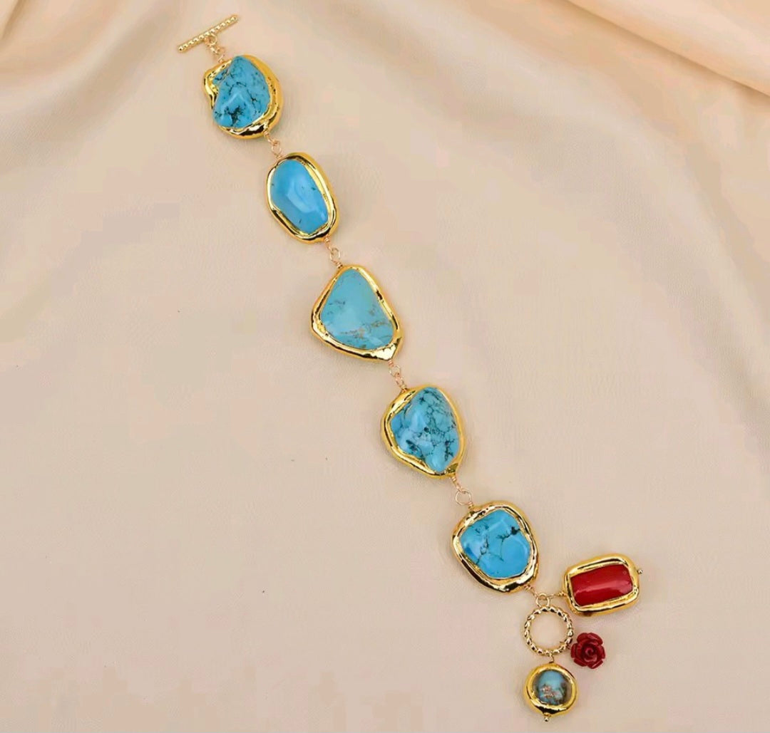 Pulsera en Cuentas de Cristal de Murano y Coral rojo