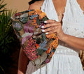 Cartera con Estampados Florales y Lentejuelas